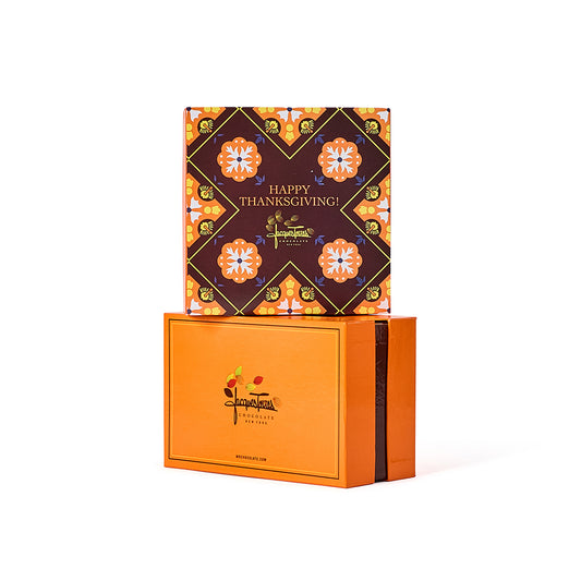 Gift box with 'Happy Thanksgiving!' design on top and brand logo on the side.