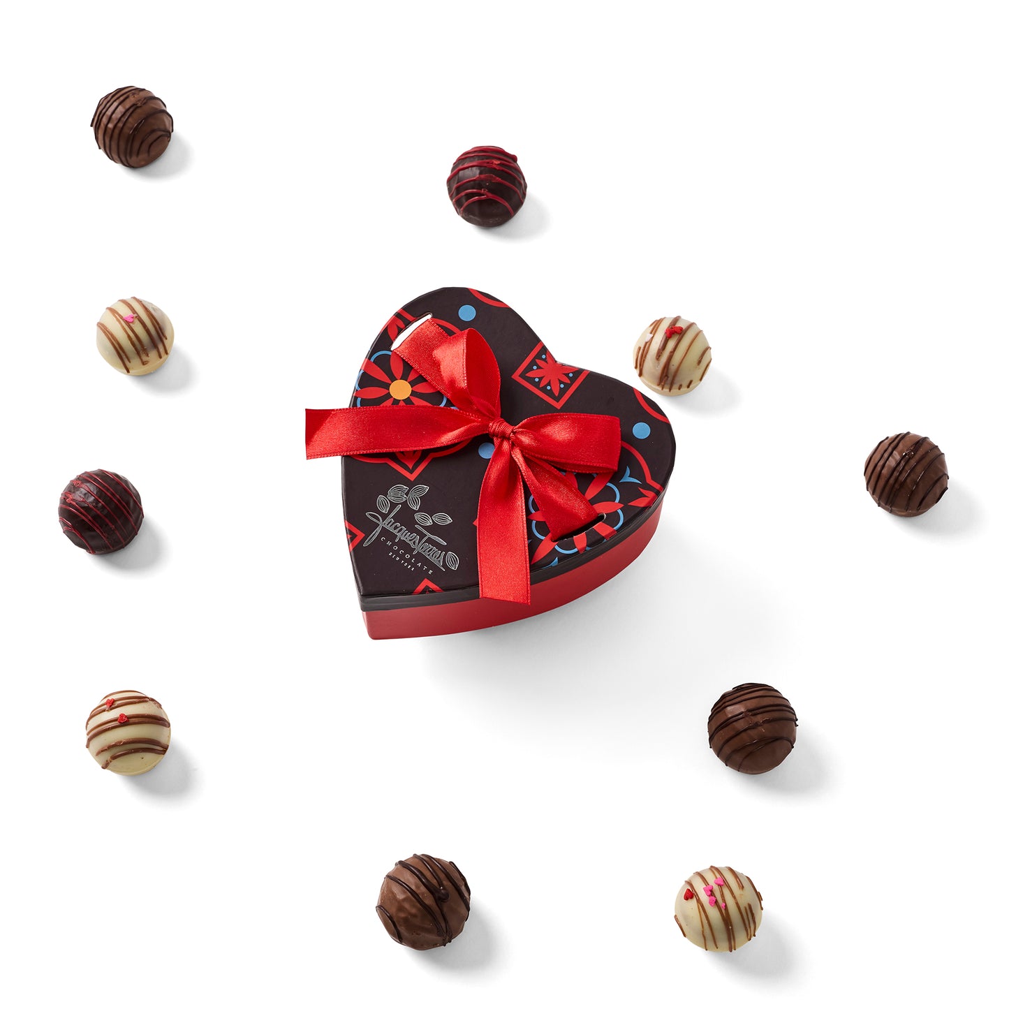 Valentine's Truffles Heart Box with truffles outside of the box