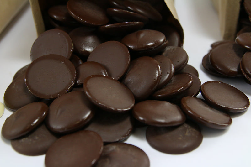 Close up of 60% Dark Chocolate Discs - Jacques Torres Chocolate