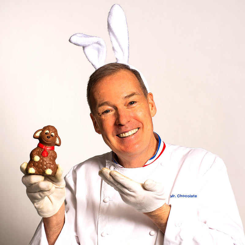 Chef Jacques Torres holding milk chocolate Easter Lamb
