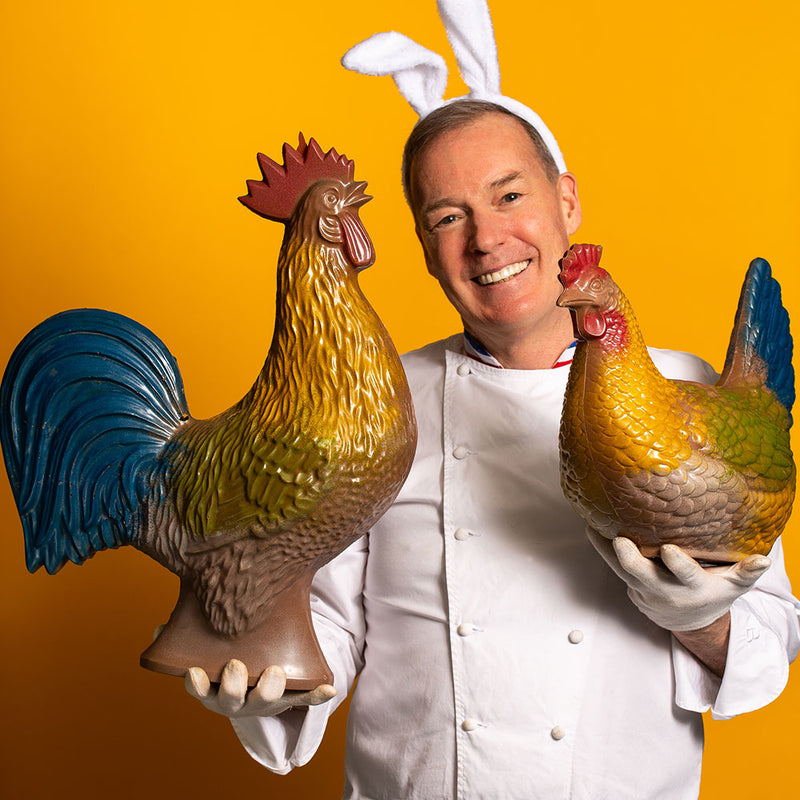 Chef Jacques Torres holding Giant chocolate Easter Rooster and Chicken