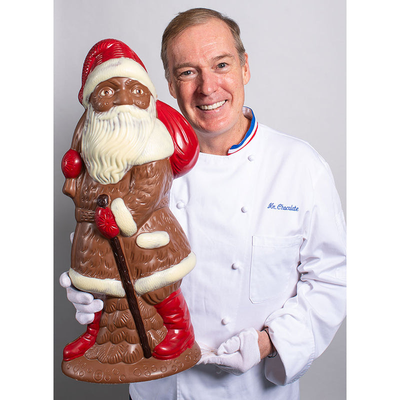 Chef Jacques Torres holding Milk Chocolate Giant Santa